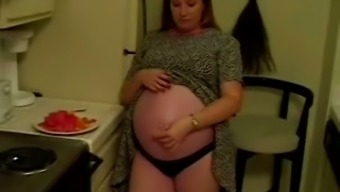 Solo Scene With Horny Pregnant Slut Rubbing Her Vagina
