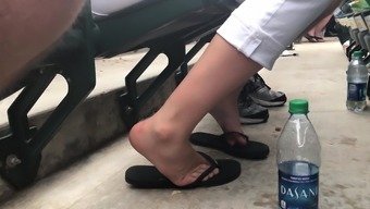 Coworker Feet In Flip Flops