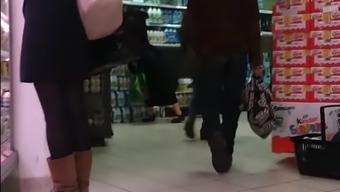 Women Shopping In Boots And Pantyhose