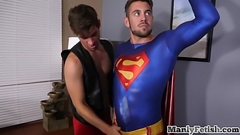 Superman Jerks Cock While Getting Pumped By Erotic Couple