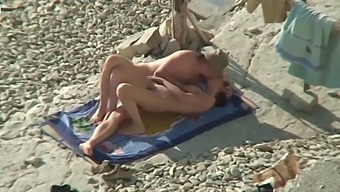 Couple Share Hot Moments On The Nudist Beach