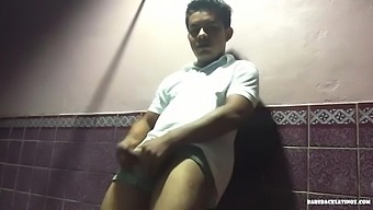 Already Boned Latin Boy Avrool Leans Against A Wall, Pulls His Shirt Down And Pulls Down His Shorts To Release His Stiff Meat. Then He Gets Naked And Starts Stroking That Big Uncut Cock Again.