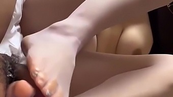 Amateur Chinese Teen Gives A Pov Footjob And Gets A Massive Orgasm
