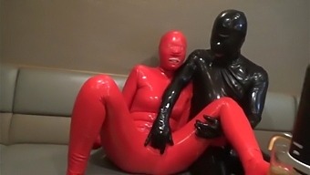Latex-Clad Couple Engages In Hardcore Sex In A Bar