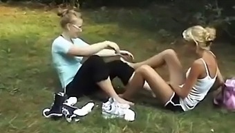 Blonde Lesbians Indulge In Foot Fetish Play Outdoors