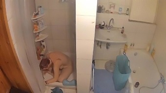 Amateur Milf Caught Masturbating In The Shower By Voyeur