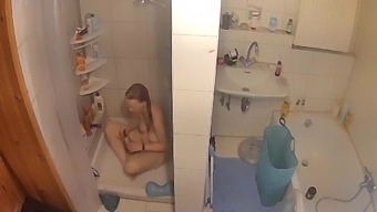 Amateur Milf Caught Masturbating In The Shower By Voyeur