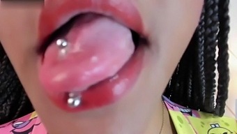 Black Ebony Beauty Shows Off Her Pierced Tongue And Teasing Skills