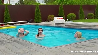 Three Horny Lesbians Get Naked By The Pool And Pleasure Each Other